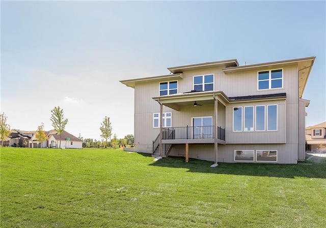 3509 W 187th St, Overland Park, KS 66085 - back of property with ceiling fan, stairway, a lawn, and a wooden deck