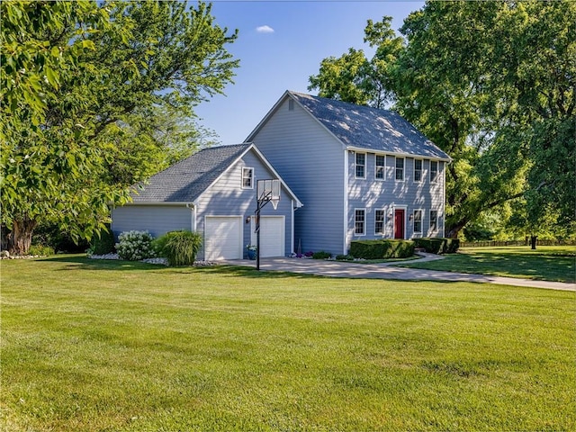 28804 E 116th St, Lees Summit, MO 64086 - colonial house with a front yard, driveway, and an attached garage