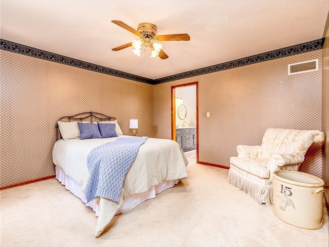 28804 E 116th St, Lees Summit, MO 64086 - bedroom with carpet flooring, ceiling fan, and connected bathroom