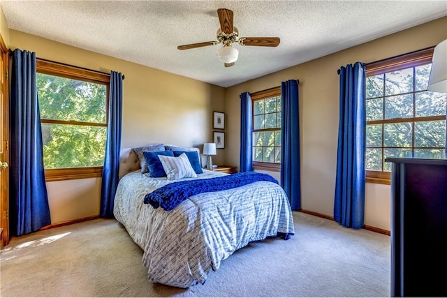 28804 E 116th St, Lees Summit, MO 64086 - carpeted bedroom with a textured ceiling and ceiling fan
