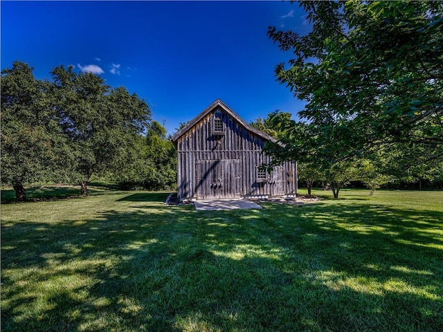 28804 E 116th St, Lees Summit, MO 64086 - view of barn with a lawn