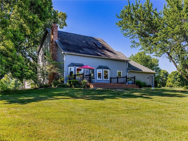28804 E 116th St, Lees Summit, MO 64086 - rear view of house with a wooden deck, a chimney, a yard, and roof with shingles