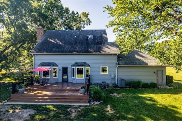 28804 E 116th St, Lees Summit, MO 64086 - rear view of property featuring a chimney, a yard, a wooden deck, and roof with shingles