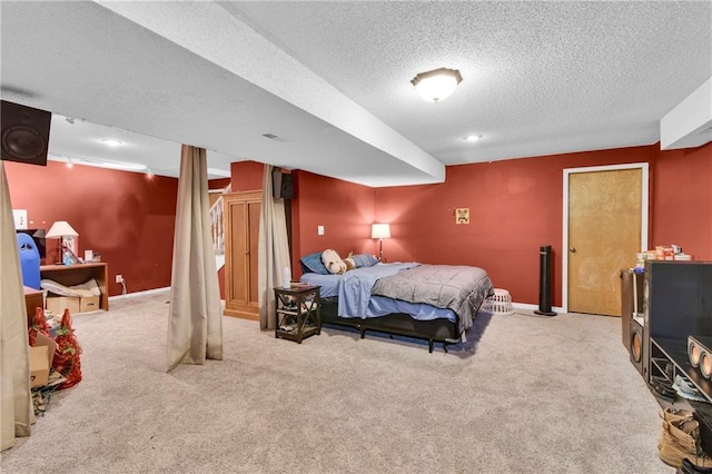 2431 S Ponca Ave, Independence, MO 64057 - carpeted bedroom with a textured ceiling and baseboards