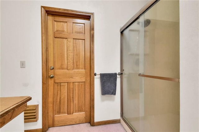 2431 S Ponca Ave, Independence, MO 64057 - bathroom featuring a stall shower and vanity