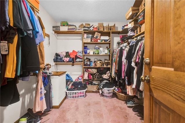 2431 S Ponca Ave, Independence, MO 64057 - walk in closet featuring carpet flooring