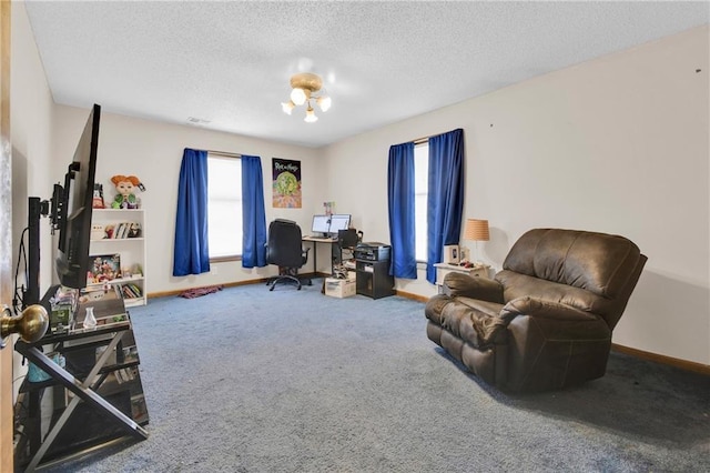 2431 S Ponca Ave, Independence, MO 64057 - carpeted office space featuring a textured ceiling and baseboards