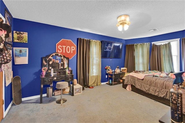 2431 S Ponca Ave, Independence, MO 64057 - carpeted bedroom with a textured ceiling