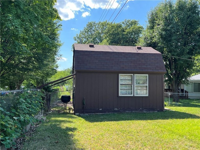 15007 E 41st St, Independence, MO 64055 - view of home's exterior featuring roof with shingles and a fenced backyard