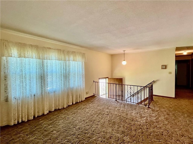 15007 E 41st St, Independence, MO 64055 - unfurnished room featuring carpet, crown molding, and a textured ceiling