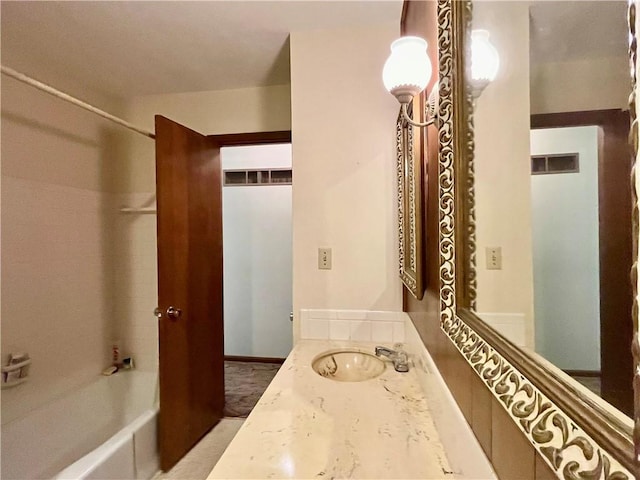 15007 E 41st St, Independence, MO 64055 - bathroom featuring vanity and bathing tub / shower combination