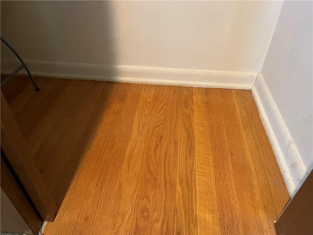 15007 E 41st St, Independence, MO 64055 - detailed view of wood finished floors and baseboards