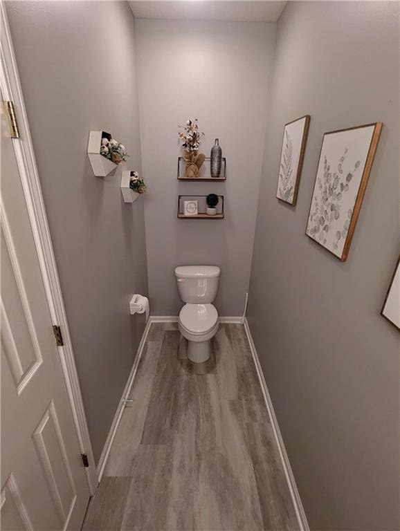 22030 W 51st Ter, Shawnee, KS 66226 - bathroom featuring wood finished floors and toilet