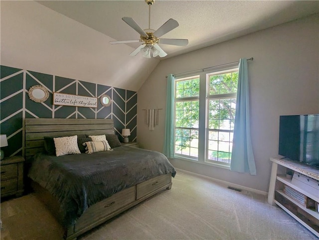 22030 W 51st Ter, Shawnee, KS 66226 - bedroom with lofted ceiling, multiple windows, carpet floors, and a ceiling fan