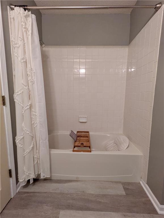 22030 W 51st Ter, Shawnee, KS 66226 - full bathroom with shower / bathtub combination with curtain and wood finished floors