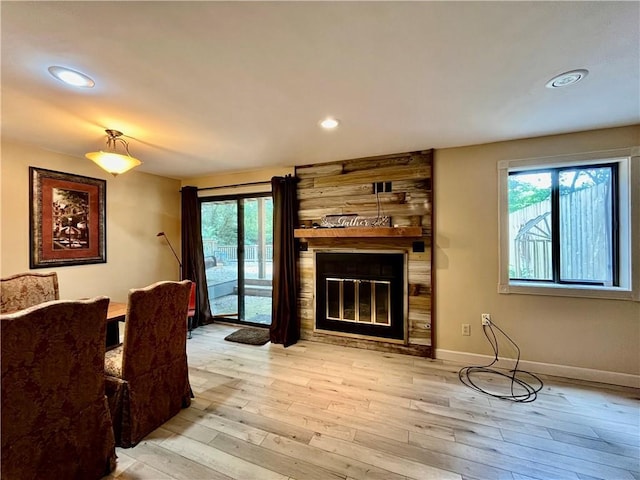 2811 Chatelain Ct Unit A, Independence, MO 64057 - living room with wood finished floors, a fireplace, and recessed lighting