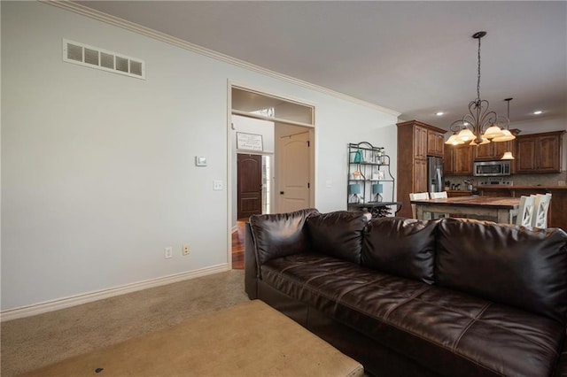 3132 SW Damon Ln, Lees Summit, MO 64082 - carpeted living room with a chandelier, ornamental molding, and recessed lighting