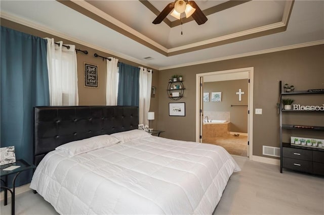 3132 SW Damon Ln, Lees Summit, MO 64082 - bedroom with a raised ceiling, ornamental molding, connected bathroom, light wood-style flooring, and ceiling fan