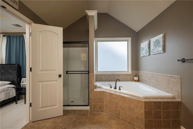 3132 SW Damon Ln, Lees Summit, MO 64082 - ensuite bathroom featuring a garden tub, a stall shower, vaulted ceiling, and tile patterned floors