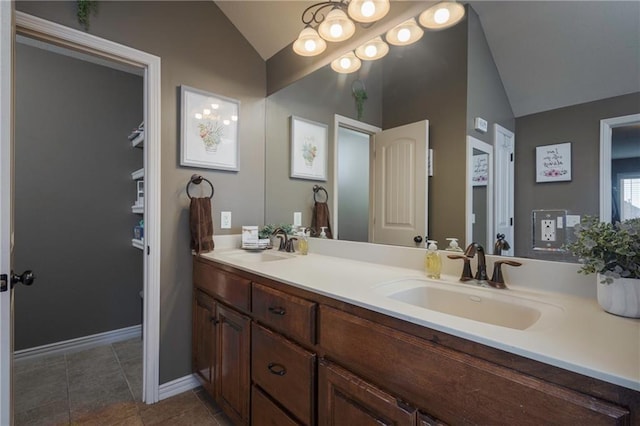 3132 SW Damon Ln, Lees Summit, MO 64082 - full bath featuring lofted ceiling, double vanity, and tile patterned floors