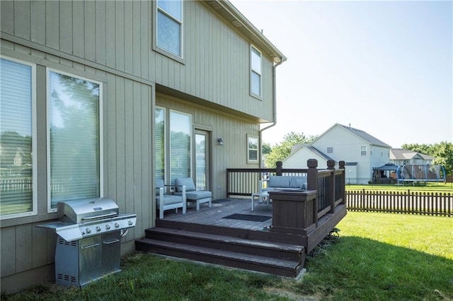 3132 SW Damon Ln, Lees Summit, MO 64082 - deck featuring area for grilling and a trampoline