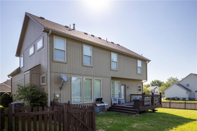 3132 SW Damon Ln, Lees Summit, MO 64082 - rear view of property with a deck, a fenced backyard, and a gate