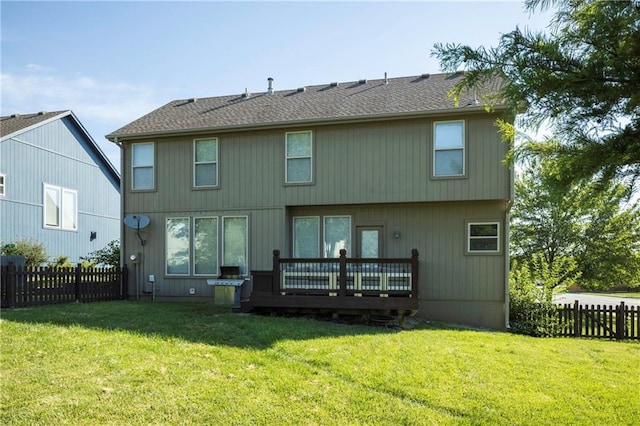 3132 SW Damon Ln, Lees Summit, MO 64082 - rear view of property featuring a fenced backyard and a wooden deck