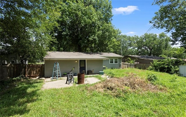 2712 S 52nd St, Kansas City, KS 66106 - back of house featuring a patio