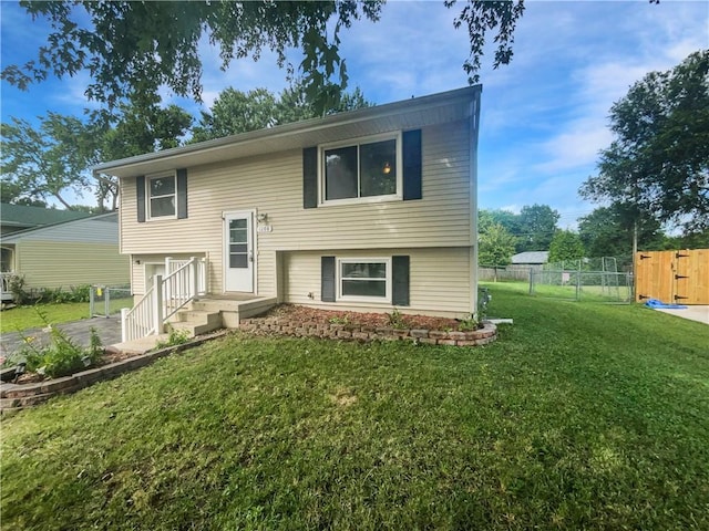 1208 Ranson Pl, Independence, MO 64057 - split foyer home featuring a gate