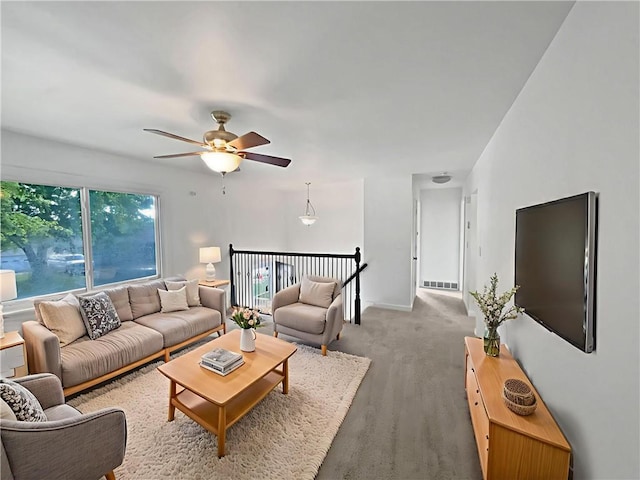 1208 Ranson Pl, Independence, MO 64057 - living area with ceiling fan and baseboards