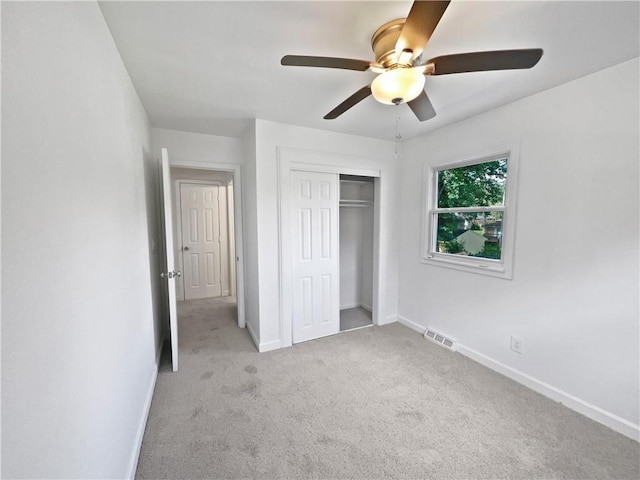 1208 Ranson Pl, Independence, MO 64057 - unfurnished bedroom featuring carpet floors, a closet, and ceiling fan
