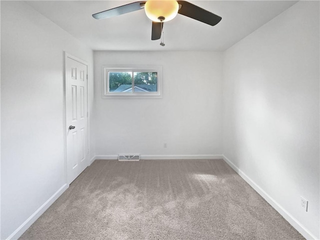 1208 Ranson Pl, Independence, MO 64057 - spare room with carpet flooring and a ceiling fan