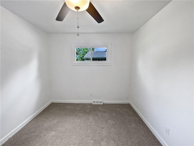 1208 Ranson Pl, Independence, MO 64057 - empty room with ceiling fan and carpet flooring