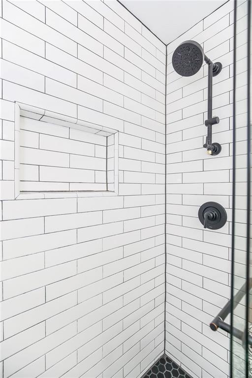 7101 Harrison St, Kansas City, MO 64131 - bathroom with tiled shower