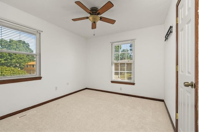 1916 NE Patterson Dr, Lees Summit, MO 64086 - empty room with light colored carpet and ceiling fan