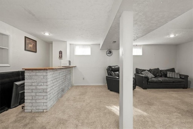 1916 NE Patterson Dr, Lees Summit, MO 64086 - indoor dry bar with a textured ceiling, carpet floors, and healthy amount of natural light