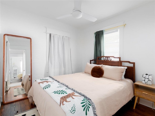 4206 Mission Rd, Kansas City, KS 66103 - bedroom featuring wood finished floors and a ceiling fan