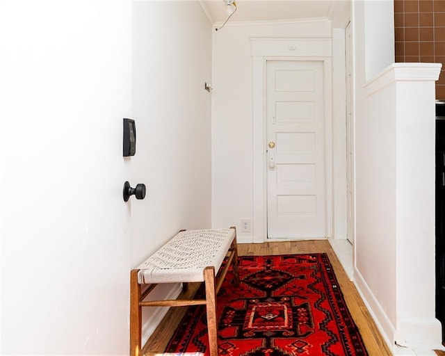 4206 Mission Rd, Kansas City, KS 66103 - corridor featuring light wood-style flooring and ornamental molding