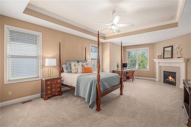 14622 S Garnett St, Olathe, KS 66062 - bedroom with a raised ceiling, ornamental molding, a fireplace, carpet floors, and ceiling fan