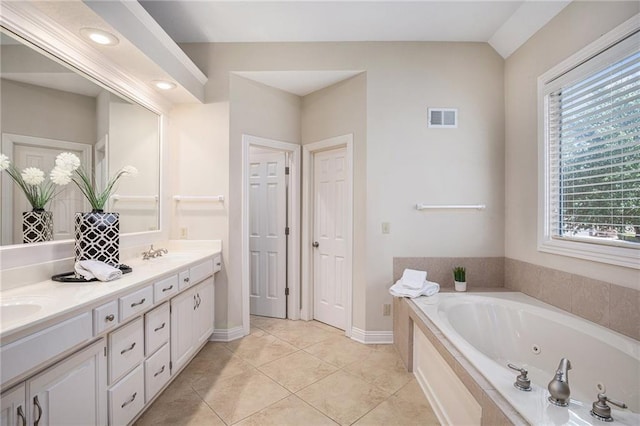 14622 S Garnett St, Olathe, KS 66062 - bathroom with double vanity, a jetted tub, tile patterned floors, and recessed lighting