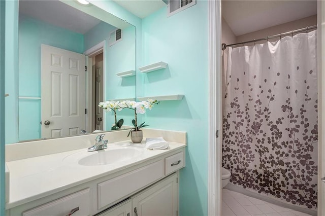 14622 S Garnett St, Olathe, KS 66062 - full bath with vanity, tile patterned floors, and a shower with curtain