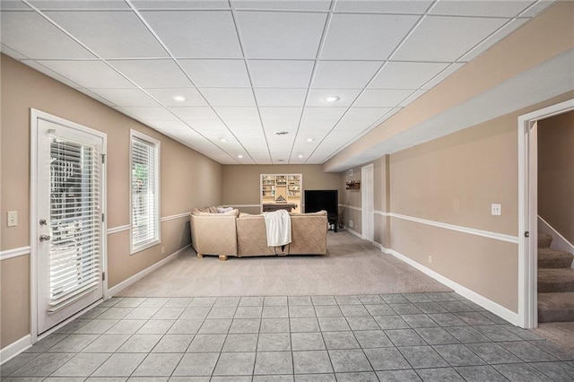 14622 S Garnett St, Olathe, KS 66062 - living room with light carpet, light tile patterned flooring, a drop ceiling, stairway, and recessed lighting