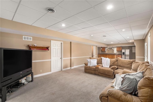 14622 S Garnett St, Olathe, KS 66062 - carpeted living area featuring recessed lighting and a paneled ceiling