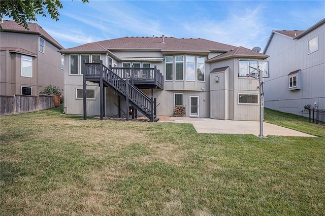 14622 S Garnett St, Olathe, KS 66062 - back of property with stairway, a wooden deck, and a patio area