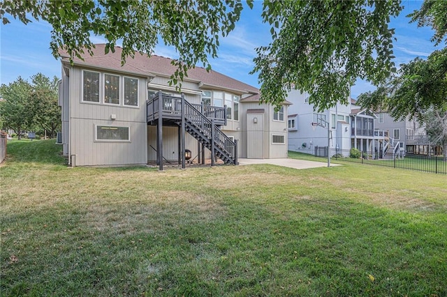 14622 S Garnett St, Olathe, KS 66062 - back of property featuring stairway, a wooden deck, a patio area, and a shingled roof