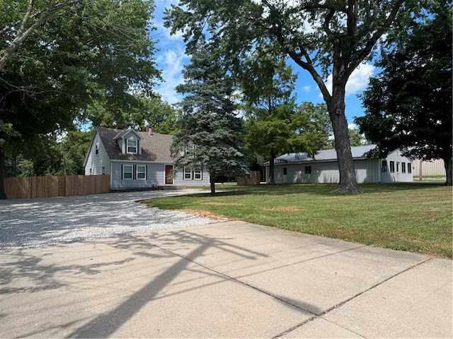 4202 Dr Greaves Rd, Grandview, MO 64030 - view of front of property with gravel driveway