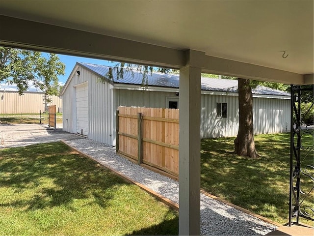 4202 Dr Greaves Rd, Grandview, MO 64030 - view of patio featuring an outdoor structure