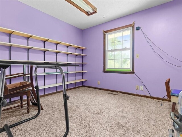 1490 216th St, Lathrop, MO 64465 - unfurnished bedroom featuring baseboards and carpet floors