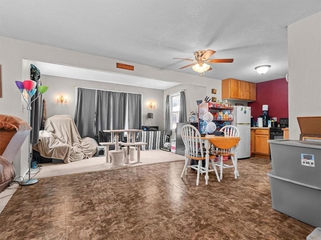 1490 216th St, Lathrop, MO 64465 - dining area with a ceiling fan and a textured ceiling