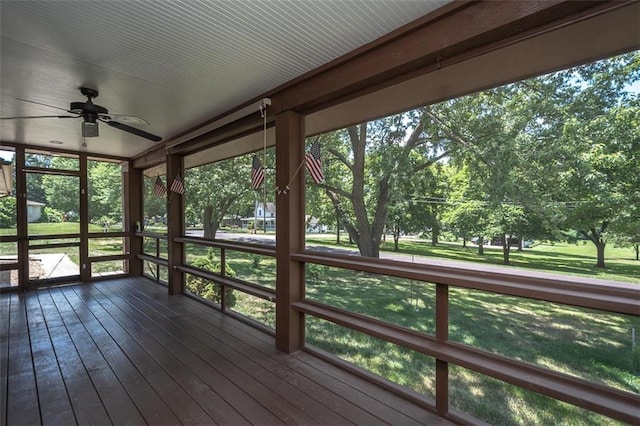 918 King St, Baldwin City, KS 66006 - wooden deck featuring a ceiling fan and a yard